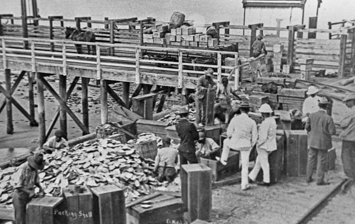 Packing shell at the end of Port Hedland jetty, c. 1910.